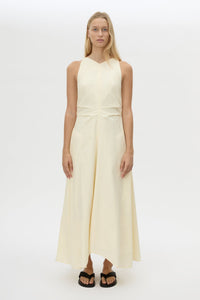 Styled view CAMILLA AND MARC Brera midi dress in pale yellow with topstitch details and side pockets.
