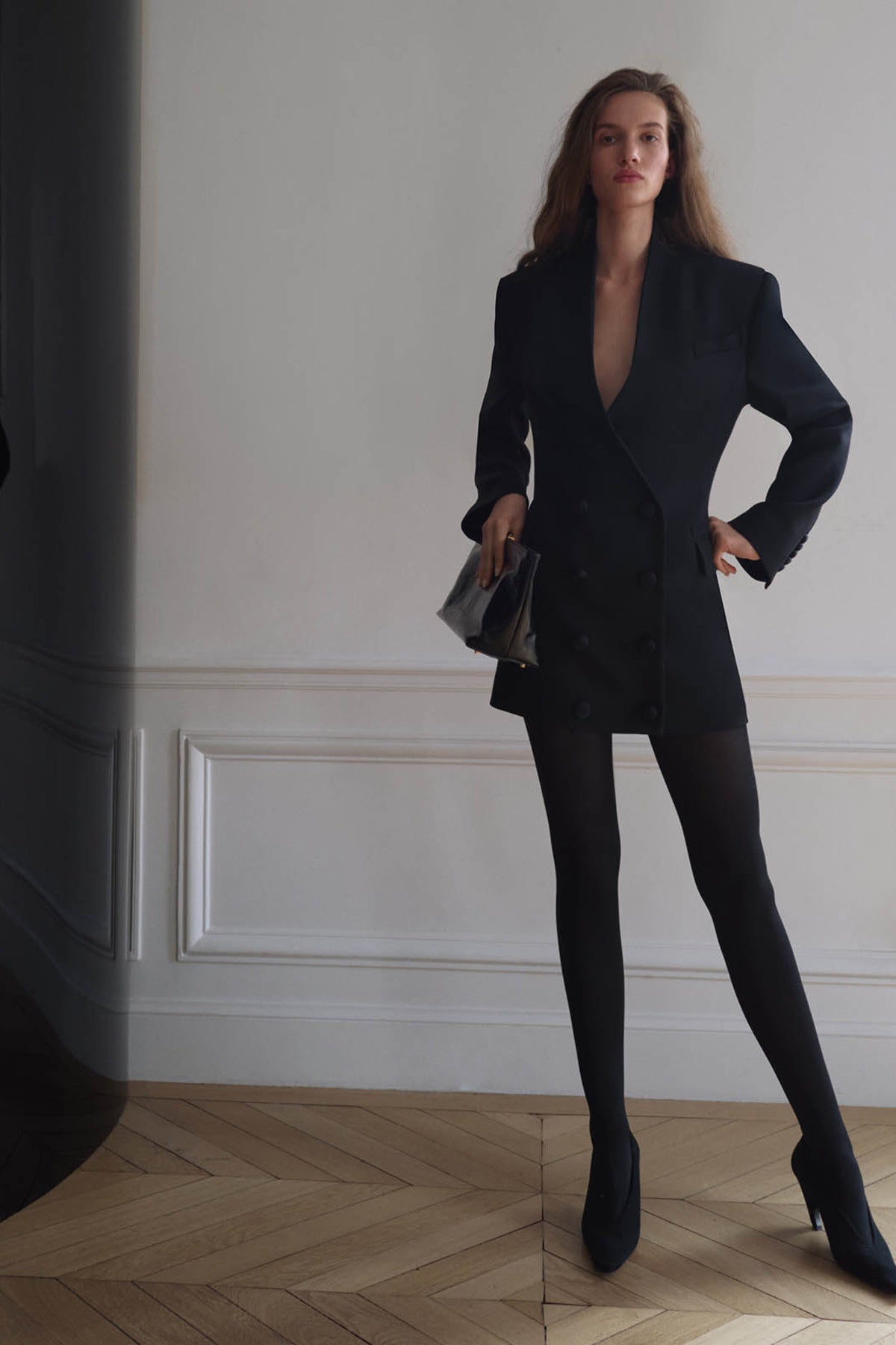 Styled view CAMILLA AND MARC Caius Tailored Mini Dress in Black with double‑breasted button closure.