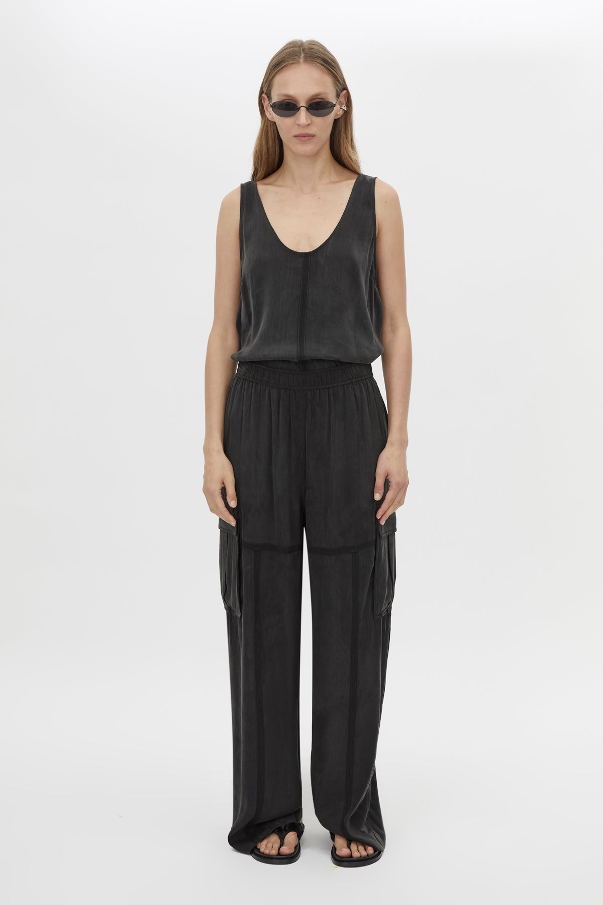 Front styled view CAMILLA AND MARC Allegro Satin Pant in Washed Black with mid‑rise cargo fit.