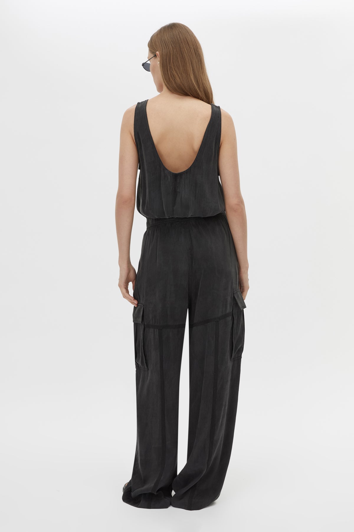 Back view CAMILLA AND MARC Allegro Satin Pant in Washed Black with mid‑rise cargo fit.
