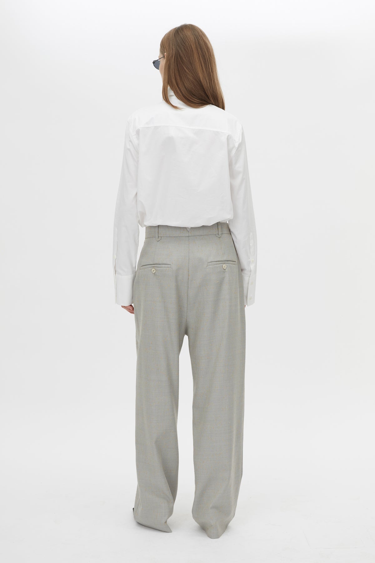 Back view CAMILLA AND MARC Aspira Pant in Dusty Blue with a wide‑leg tailored silhouette.