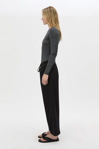 Side view CAMILLA AND MARC Beau Tapered Crop Pant in Black with elasticated waistband.