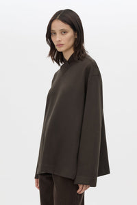 Cropped view CAMILLA AND MARC Bessette long sleeve top in espresso brown top with high neck. 
