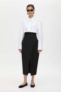 Front view CAMILLA AND MARC Caius High Corset Waist Midi Skirt in Black with structured waist.