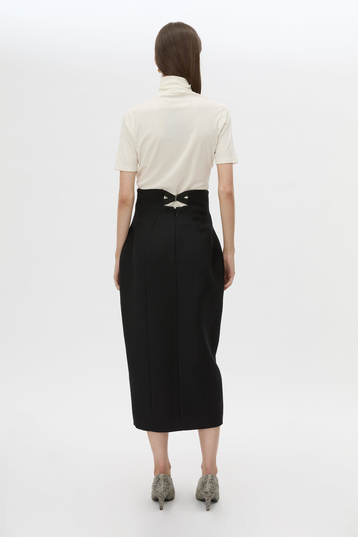 Back view CAMILLA AND MARC Caius High Corset Waist Midi Skirt in Black with structured waist.