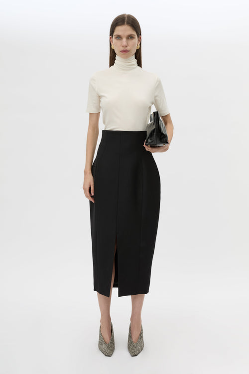 Front view CAMILLA AND MARC Caius High Corset Waist Midi Skirt in black with sculpted darts.
