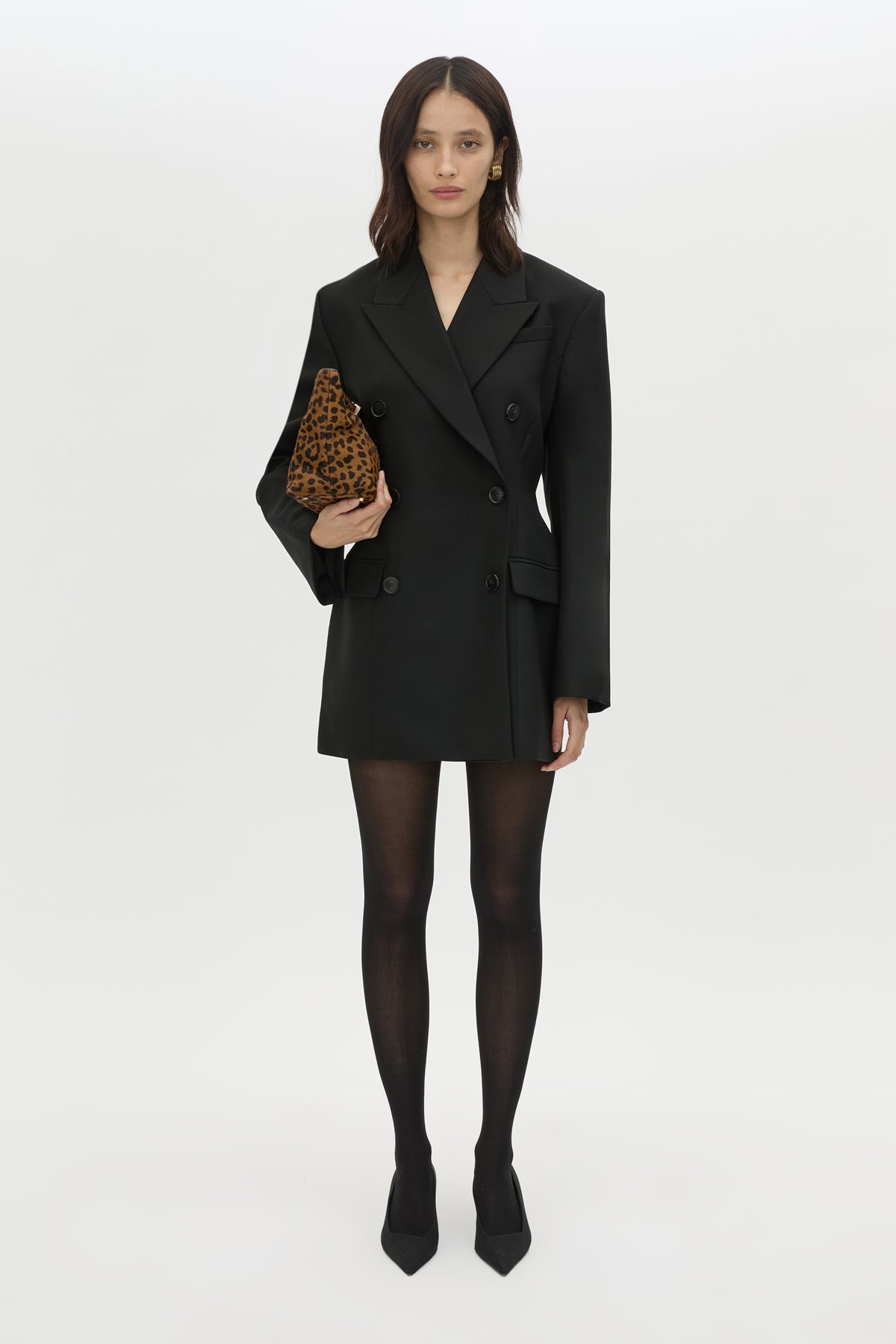 Front view CAMILLA AND MARC Cassie long sleeve mini dress in black with open back removable chain detail.