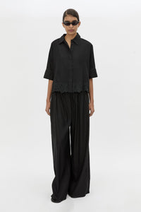 Front view CAMILLA AND MARC Chara Embroidered Relaxed Pant in Black with encased elastic waistband.