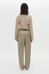Back view CAMILLA AND MARC Dakota long sleeve relaxed top in taupe with crew neckline and semi sheer fabrication.