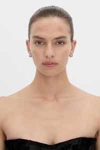 Front view CAMILLA AND MARC Eagan Studs in silver with petite semi‑sphere design and ruched texture.