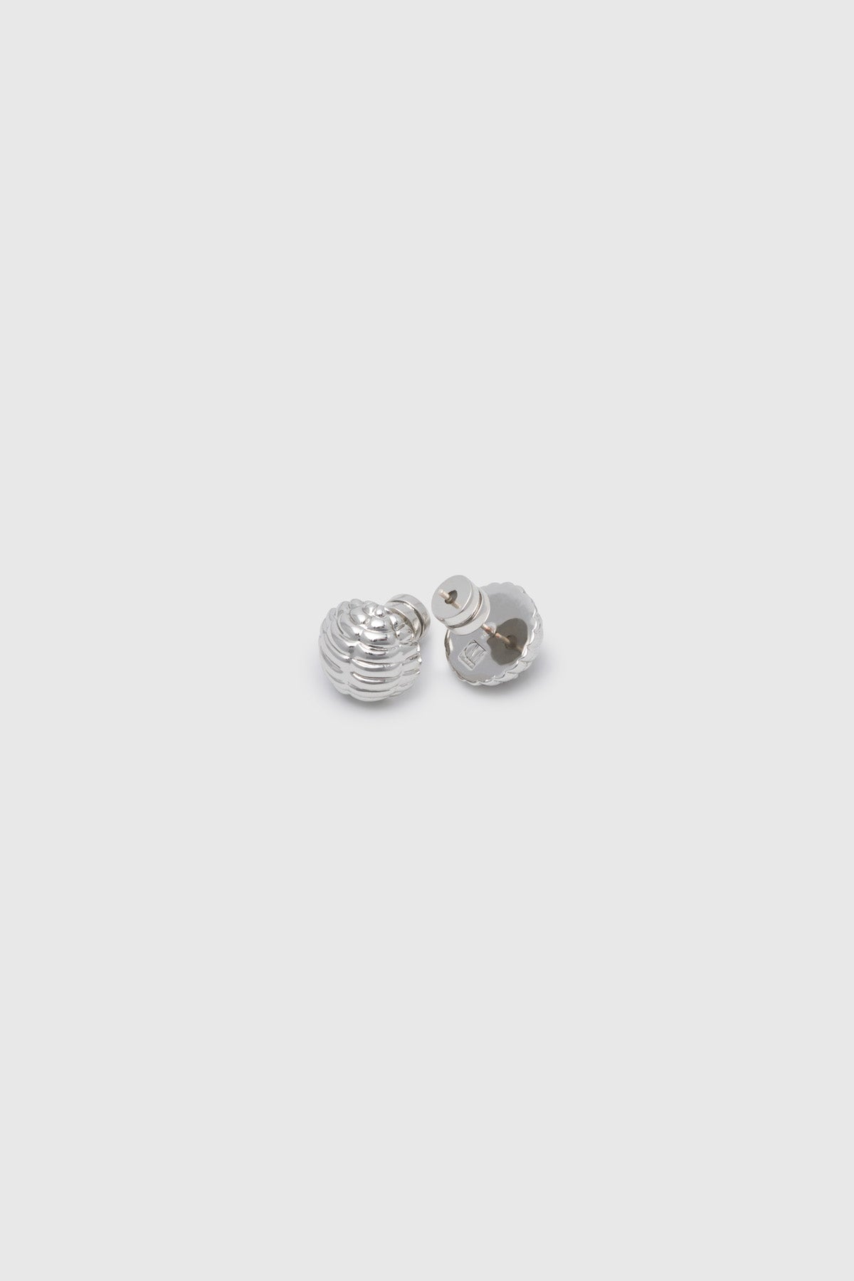 Ghost view CAMILLA AND MARC Eagan Studs in silver with petite semi‑sphere design and ruched texture.