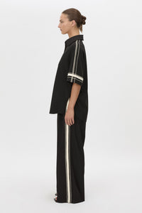 Side view CAMILLA AND MARC relaxed Enna Shirt in black with embroidery detail.