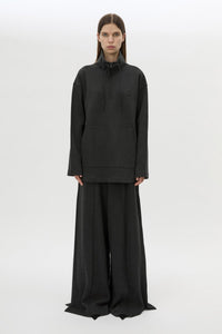 Front styled view CAMILLA AND MARC Figura Sweater in Coal Grey with cropped fleece, pullover design and quarter zip. 