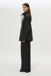 Side view CAMILLA AND MARC Figura Sweater in Coal Grey with cropped fleece, pullover design and quarter zip. 