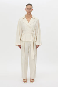 Front-styled view CAMILLA AND MARC Inca Belted Wrap Jacket in ivory.