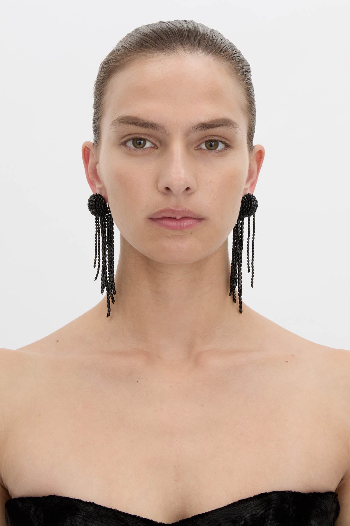 Front view CAMILLA AND MARC Irida Drop Earrings in black with glossy beaded drop design.