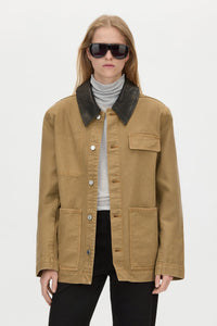 Cropped view CAMILLA AND MARC Luca Utility Jacket in Camel Brown with a contrast leather collar.