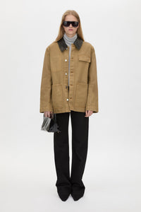 Front styled view CAMILLA AND MARC Luca Utility Jacket in Camel Brown with a contrast leather collar.