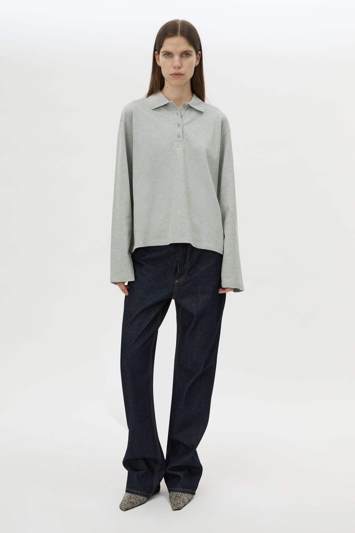 Front view CAMILLA AND MARC Moreno Long Sleeve Polo Top in Grey Marle with quarter button placket, and embroidered monogram.
