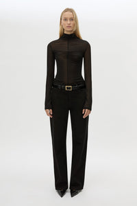 Front styled view CAMILLA AND MARC Novel Long Sleeve Stocking Top in Black with ruched bust detail.
