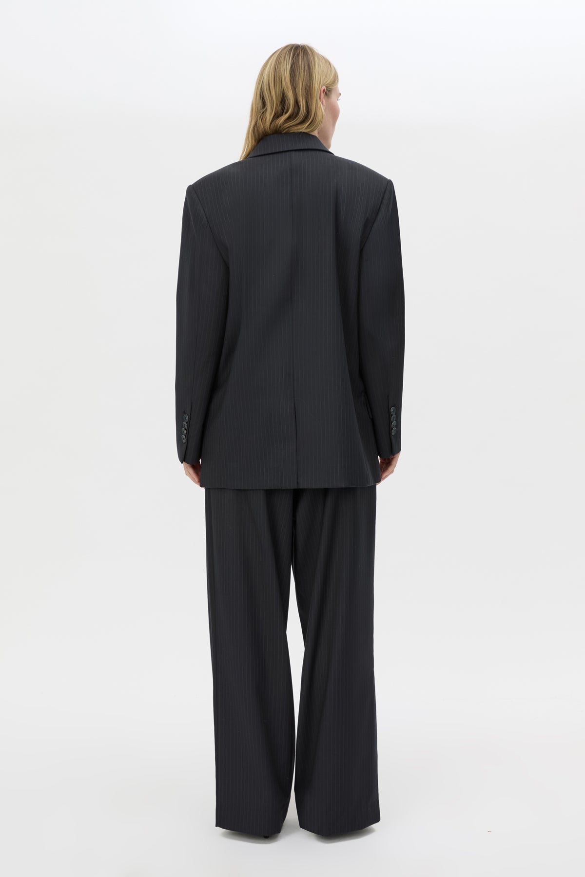 Back view CAMILLA AND MARC Orban Oversized Blazer in Navy pinstripe with double‑breasted button closure.
