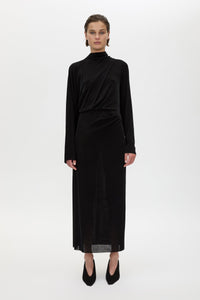 Front styled view CAMILLA AND MARC Ravine Midi Dress in Black with asymmetric draped neckline.