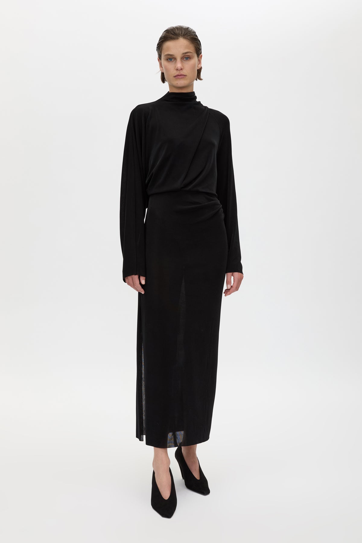 Front view CAMILLA AND MARC Ravine Midi Dress in Black with asymmetric draped neckline.