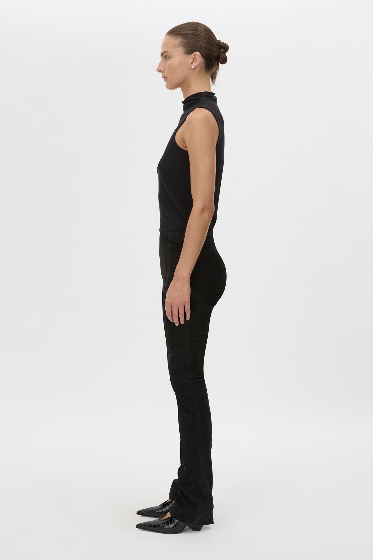 Side view CAMILLA AND MARC high-waisted Romina Pant in black stretch suede fabrication.