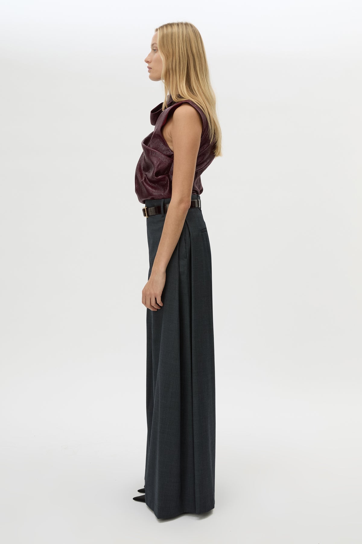 Side view CAMILLA AND MARC Sana Tailored Top in Burgundy with draped detailing and a high neckline.