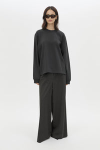 Front view CAMILLA AND MARC Studio Graphic Long Sleeve Top in Grey with boucle embroidered monogram.  
