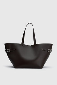 Front view CAMILLA AND MARC Willa Tote in Chocolate Brown with side strap and buckle detailing and magnetic button closure.