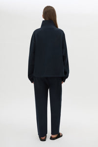 Ghost view CAMILLA AND MARC Zylus funnel neck pullover sweater in navy/white with contrast embroidered monogram. 