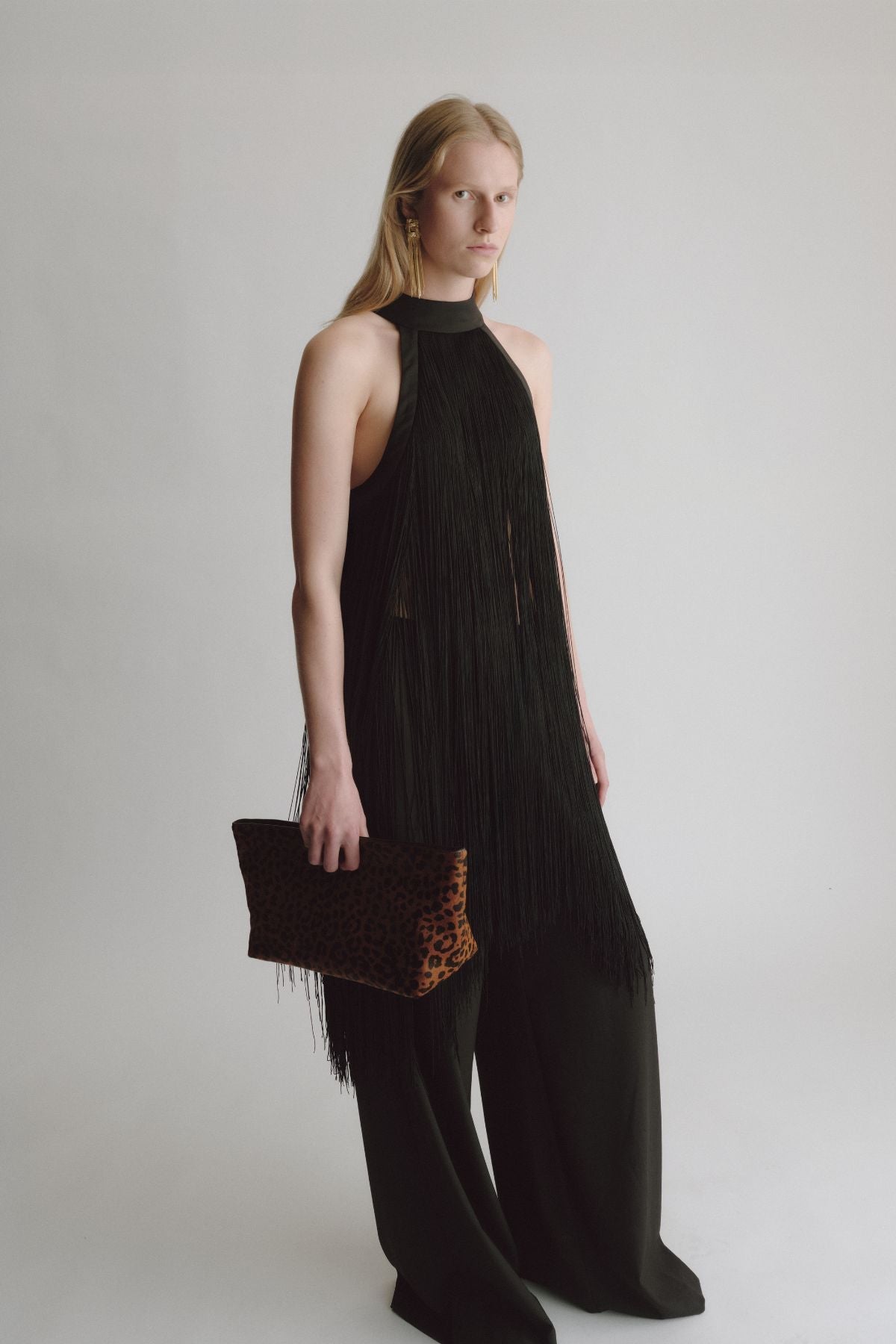 Styled view CAMILLA AND MARC Poppy Leopard Clutch with pony‑finish fabrication.