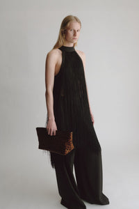 Styled view CAMILLA AND MARC Poppy Leopard Clutch with pony‑finish fabrication.