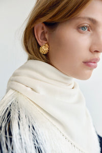 Styled view CAMILLA AND MARC Friesian Earrings with worn look 18k gold plating. 